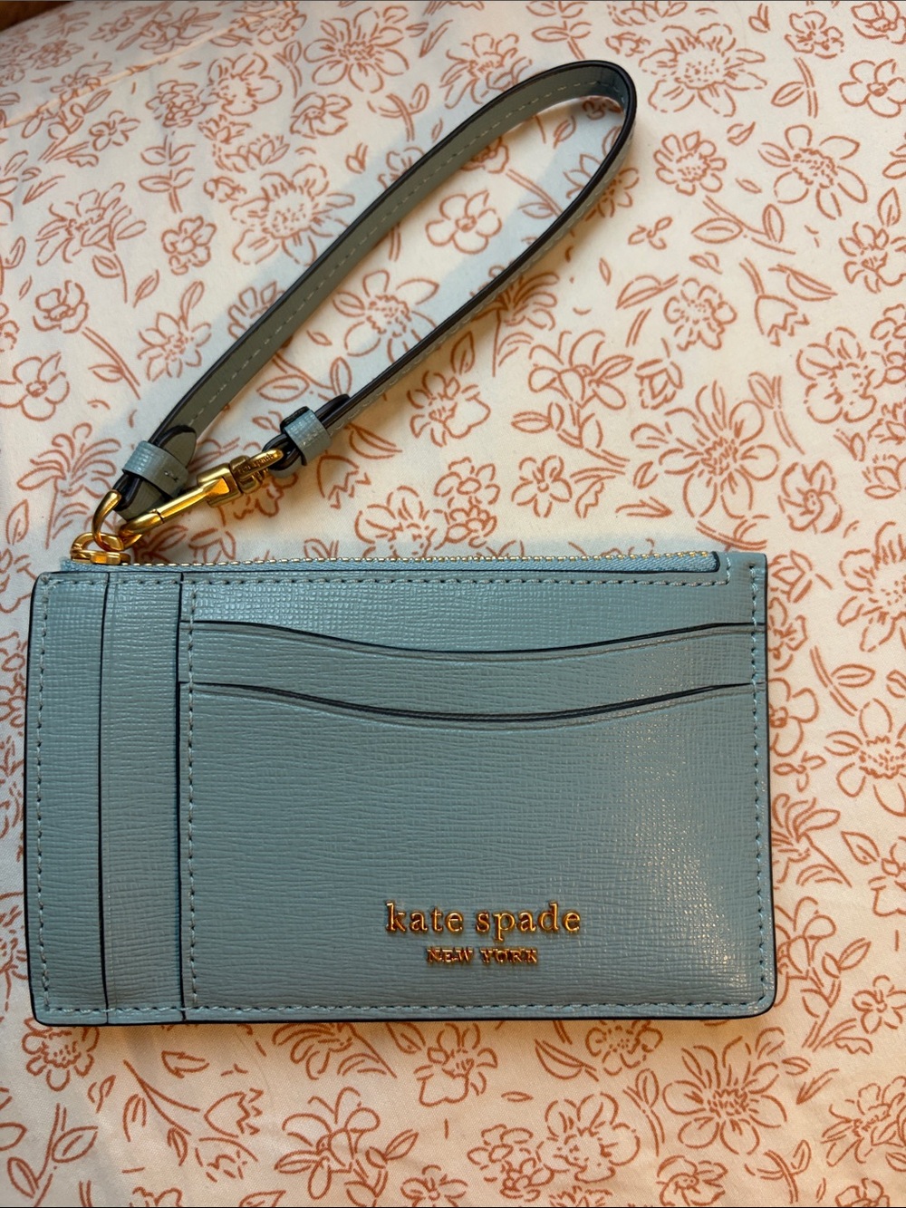 kate spade light blue wristlet card case with gold hardware